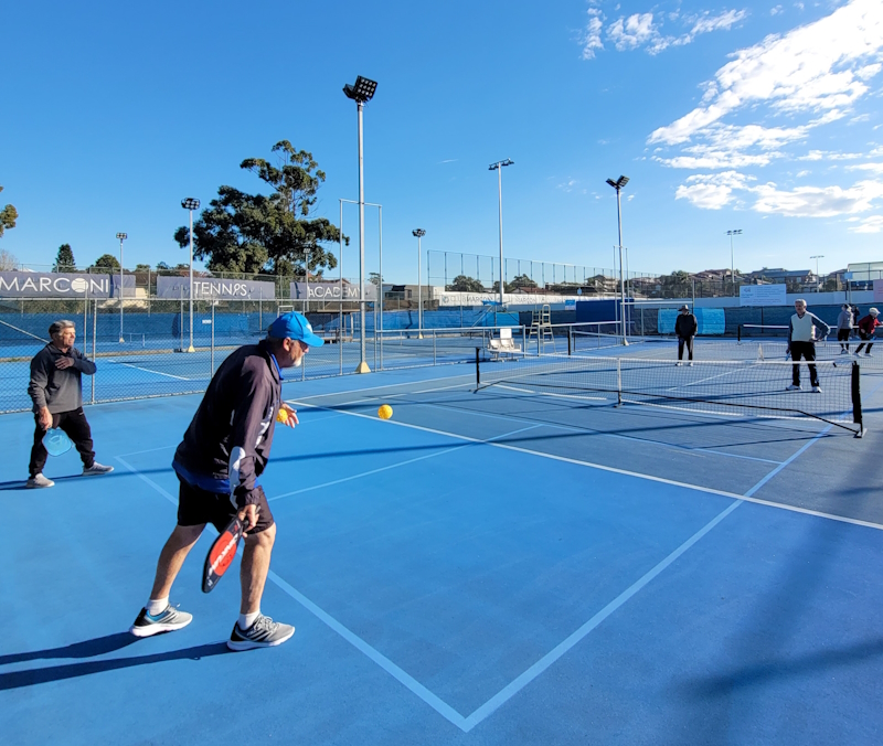 Pickleball at Marconi action shot cropped